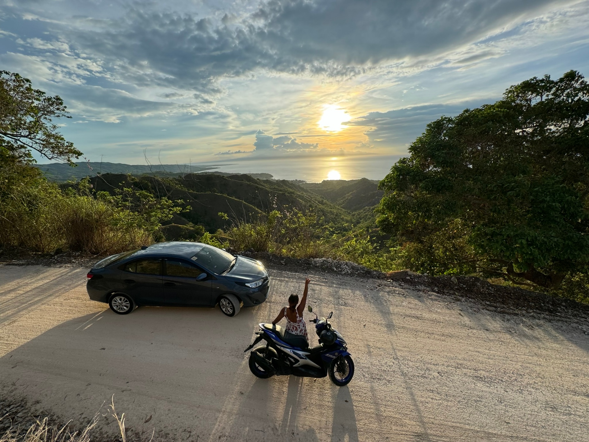 Sunset over the western coast of Siquijor from a mountain road
