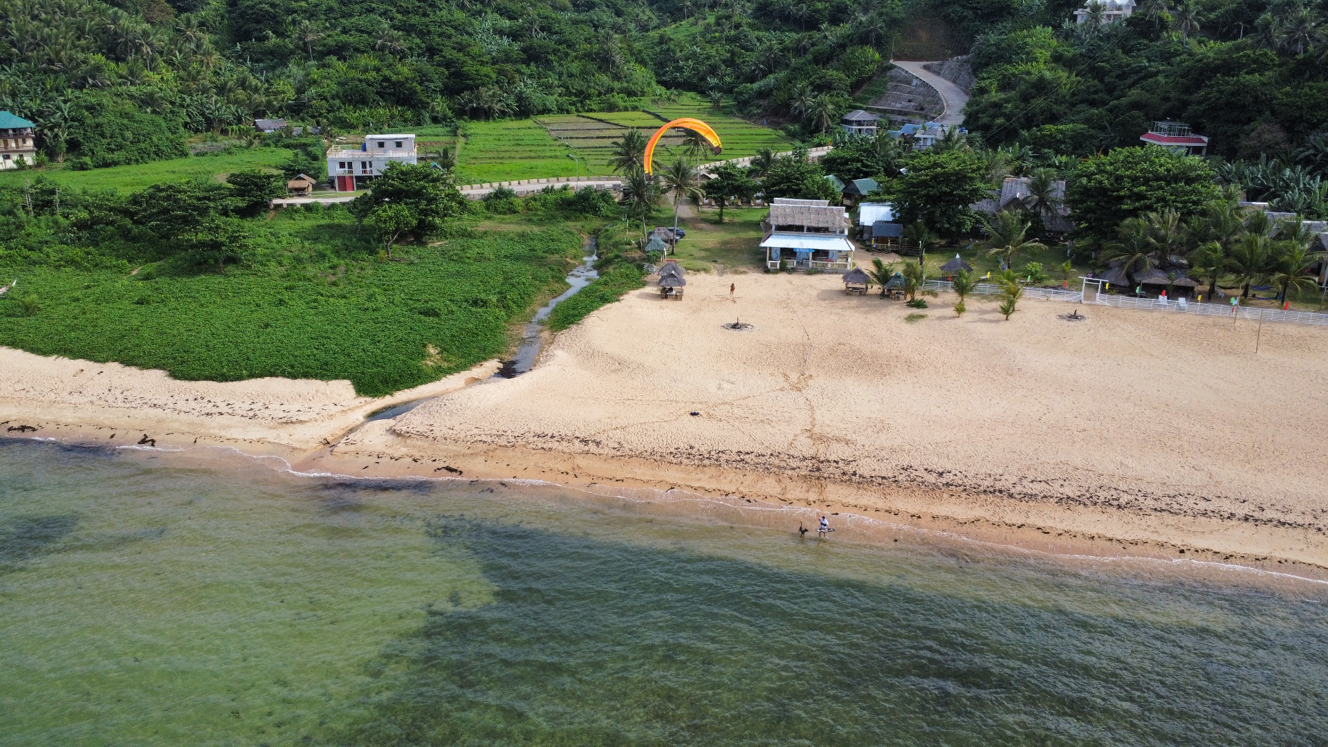 Aerial view of a quiet Philippine beach used as a kite spot